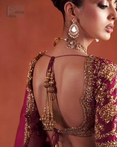 Back Profile: Elegant back view of the short blouse and lehenga, embodying the true spirit of South Asian fashion.