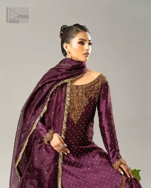 Tissue Silk Texture: A detailed shot of the 100% pure tissue silk in deep plum, highlighting its unique shimmering texture