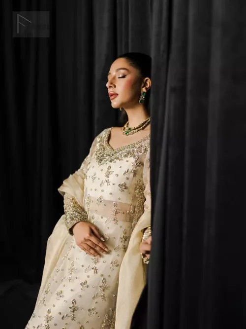 Exquisite silver and golden embroidery adds a subtle sparkle, making you radiate confidence with every step.