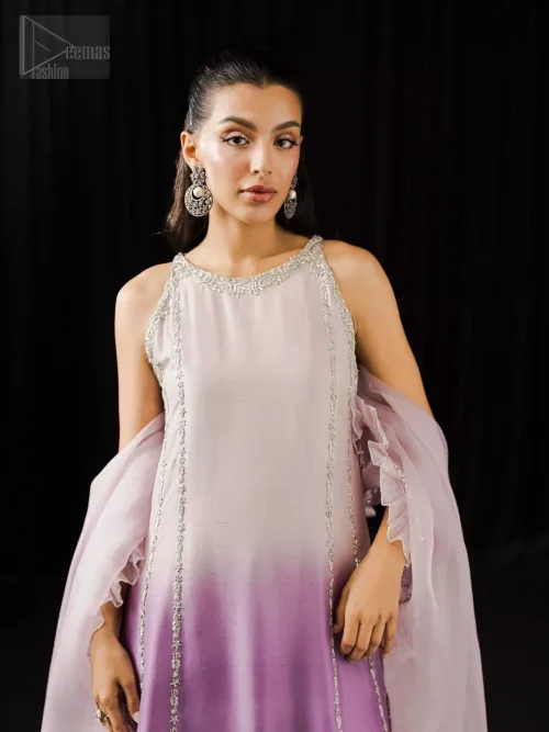 Refined party outfit in pure silk featuring embroidered halterneck shirt, fixed-waist trousers, and soft organza layer.