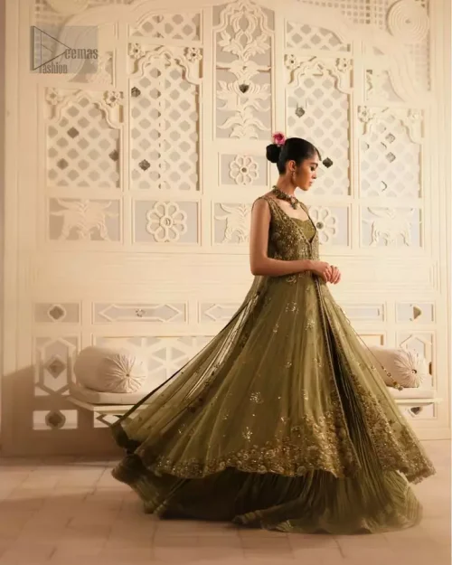 Olive green front-open gown layered over a crushed lehenga, styled for a refined mehndi statement.